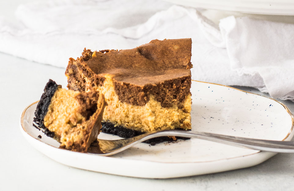 Easy Chocolate Pumpkin Cheesecake: Oreo Crust & Bourbon Whipped Cream
